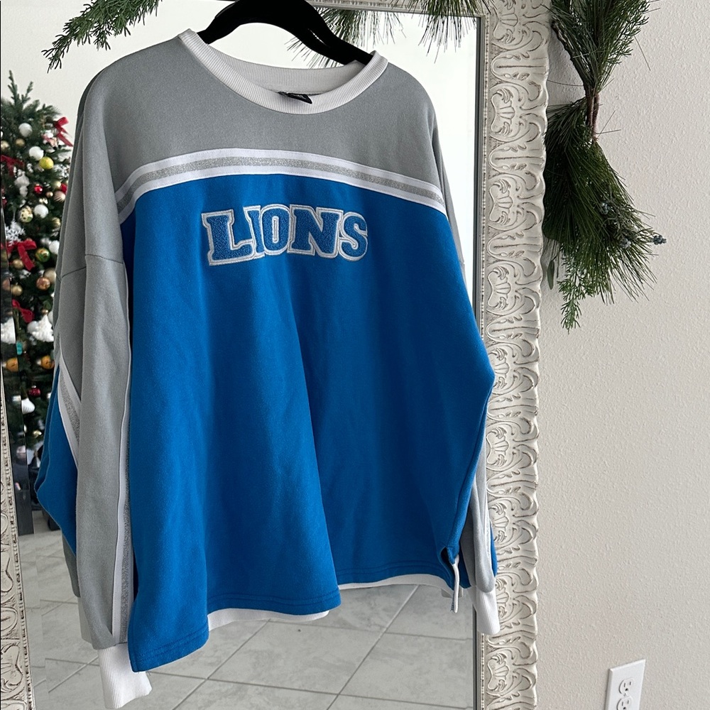 Lions Women’s Blue and Gray Football Sweatshirt
